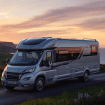 mage of a coach built motorhome in the country side